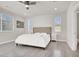 Spacious bedroom features wood-look floors, ample natural light, and neutral color palette at 11856 Barona Mesa Ave, Las Vegas, NV 89138