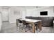 Open concept dining room connecting the kitchen and living room with contemporary style at 11856 Barona Mesa Ave, Las Vegas, NV 89138