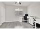 Bright, spacious office/bedroom featuring wood floors, natural light and modern decor at 11856 Barona Mesa Ave, Las Vegas, NV 89138
