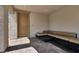 Covered patio with pavers, seating, and front door at 11856 Barona Mesa Ave, Las Vegas, NV 89138