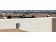 Scenic view from rooftop showing city skyline and residential roofs in the distance at 11856 Barona Mesa Ave, Las Vegas, NV 89138