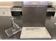 Upgrade sample featuring Lubbock Slate cabinets, Simply White quartz countertops, and a Moen Gibson faucet at 11881 Pied Harrier Ave, Las Vegas, NV 89138