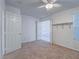 Empty carpeted bedroom with view into the house and good natural light at 1424 Heartstring Ct, Henderson, NV 89002