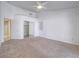 Spacious bedroom with a ceiling fan, closet and access to other rooms at 1424 Heartstring Ct, Henderson, NV 89002