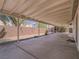 Relax on the spacious covered patio, offering ample room for outdoor enjoyment and entertaining at 1424 Heartstring Ct, Henderson, NV 89002