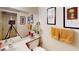 Functional bathroom with vanity, toilet, decorative towels and art at 1745 Walingwood Dr, North Las Vegas, NV 89031
