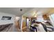 Eat-in kitchen featuring stainless steel appliances, tile countertops, and lots of natural light at 1745 Walingwood Dr, North Las Vegas, NV 89031