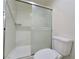 This bathroom features a toilet and a shower with a sliding glass door at 2035 E Warm Springs Rd # 1017, Las Vegas, NV 89119