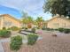 Relax in the community picnic area, nicely landscaped with desert-style shrubs and rocks at 2035 E Warm Springs Rd # 1017, Las Vegas, NV 89119