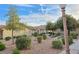 Well-maintained grounds with walking paths, decorative rocks, shrubs, and a charming lamp post at 2035 E Warm Springs Rd # 1017, Las Vegas, NV 89119