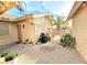 Enclosed patio featuring a grill, a small garden, and desert landscaping at 2035 E Warm Springs Rd # 1017, Las Vegas, NV 89119