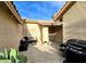 Enclosed patio featuring a grill, lounge furniture, and drought resistant landscaping at 2035 E Warm Springs Rd # 1017, Las Vegas, NV 89119