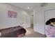 Neutral toned bedroom with a vanity, built in closets and carpet at 2117 Leatherbridge Ct, North Las Vegas, NV 89081