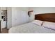 Well-lit bedroom features a comfortable bed, closet, and bright, neutral walls at 2117 Leatherbridge Ct, North Las Vegas, NV 89081