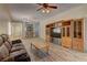 Open living area showcases wood-look tile flooring and seamless connection to dining and kitchen areas at 2304 Willow Wren Dr, North Las Vegas, NV 89084