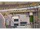 Bird's eye view of a modern home, showcasing solar panels, cozy patio, garden, and stone accents at 2367 Ridgeline Wash St, Las Vegas, NV 89138