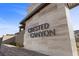 Crested Canyon stone entrance, creating a welcoming introduction to this neighborhood with blue sky background at 2367 Ridgeline Wash St, Las Vegas, NV 89138