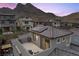 Rooftop deck with stylish seating and mountain views; perfect for entertaining or enjoying the sunset at 2367 Ridgeline Wash St, Las Vegas, NV 89138