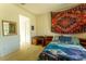 Cozy bedroom with a desk, tapestry, and ample space at 2386 Hardin Ridge Dr, Henderson, NV 89052