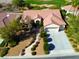 Inviting one-story home featuring a mature front yard and long driveway at 2386 Hardin Ridge Dr, Henderson, NV 89052