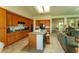 Well-appointed kitchen with modern appliances and a seamless flow into the living room at 2386 Hardin Ridge Dr, Henderson, NV 89052