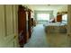 Bright main bedroom with large window, plush carpet, and generous wardrobe at 2386 Hardin Ridge Dr, Henderson, NV 89052