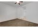 Comfortable bedroom offers neutral carpet, ample space and view to the next room at 2512 Libretto Ave, Henderson, NV 89052