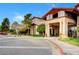 Beautiful two-story building features desert landscaping, portico entry, and hardscape at 2512 Libretto Ave, Henderson, NV 89052