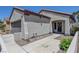 Inviting single-story home with a two-car garage, desert landscaping, and a charming entrance at 2512 Libretto Ave, Henderson, NV 89052