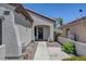 Charming single-story house featuring a covered front porch and desert landscaping at 2512 Libretto Ave, Henderson, NV 89052