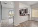 Bright kitchen features tile floors and a breakfast bar overlooking the backyard at 2512 Libretto Ave, Henderson, NV 89052