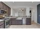 Well-equipped kitchen featuring stainless steel appliances, neutral countertops, and ample cabinet space at 2512 Libretto Ave, Henderson, NV 89052