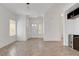 Spacious living room with natural light and tile floors leading to the entryway at 2512 Libretto Ave, Henderson, NV 89052