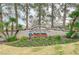 Palm Valley Golf Club entrance featuring lush landscaping and mature trees, offering a welcoming community setting at 2801 Byron Dr, Las Vegas, NV 89134