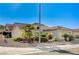Single-story house with desert landscaping and a two-car garage at 2801 Byron Dr, Las Vegas, NV 89134