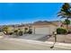 Charming single-story house featuring desert landscaping and a two-car garage at 2801 Byron Dr, Las Vegas, NV 89134