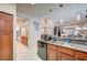 Kitchen featuring wooden cabinets, sink, and dishwasher at 2801 Byron Dr, Las Vegas, NV 89134