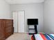 Bedroom featuring a closet, carpet floors, and neutral color paint at 3040 Balcones Fault Ave, North Las Vegas, NV 89081