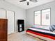 Cozy bedroom with neutral walls, carpet, and natural light from the window at 3040 Balcones Fault Ave, North Las Vegas, NV 89081