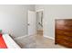 Bedroom featuring closet, dresser, and open door to hallway at 3040 Balcones Fault Ave, North Las Vegas, NV 89081