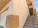 Home's entry with stairs leading to front door; stucco exterior and attached garage at 3040 Balcones Fault Ave, North Las Vegas, NV 89081