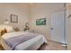 Well-lit bedroom with a plush bed, natural light, and neutral paint at 3088 Paseo Mountain Ave, Henderson, NV 89052