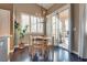 Dining area boasts natural light, plantation shutters, and a modern light fixture at 3088 Paseo Mountain Ave, Henderson, NV 89052