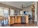 Kitchen island with stainless steel dishwasher and granite countertops at 3088 Paseo Mountain Ave, Henderson, NV 89052