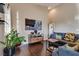 Cozy living room with high ceilings and hardwood flooring at 3088 Paseo Mountain Ave, Henderson, NV 89052