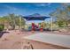 Community playground with shade cover and recreational activities for  at 3088 Paseo Mountain Ave, Henderson, NV 89052