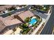 Relaxing pool surrounded by lush landscaping creates a private backyard oasis at 3088 Paseo Mountain Ave, Henderson, NV 89052