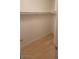 Bright walk-in closet with laminate floors and hanging racks at 3151 Soaring Gulls Dr # 1074, Las Vegas, NV 89128