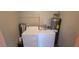 Laundry area features a washer, dryer, and water heater at 3151 Soaring Gulls Dr # 1074, Las Vegas, NV 89128