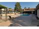 Relaxing community pool area with ample lounge chairs for residents to enjoy the outdoors at 3151 Soaring Gulls Dr # 1074, Las Vegas, NV 89128